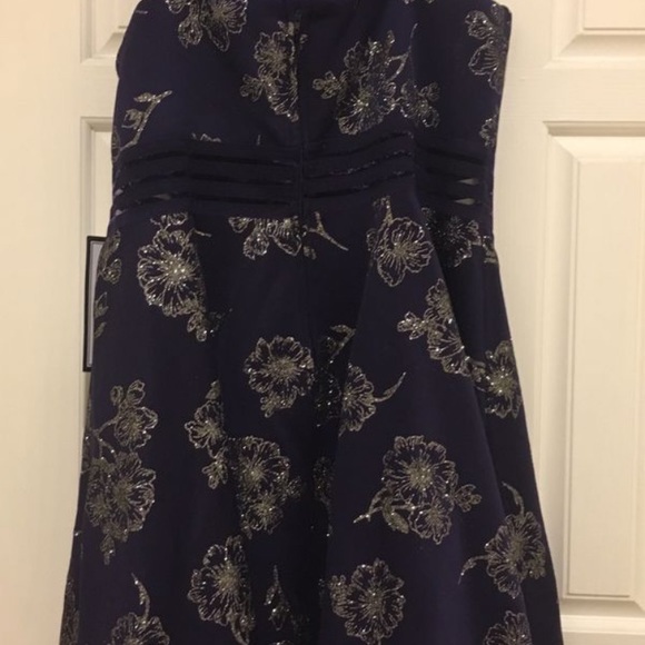 Purple cocktail dress with glittery flowers. - Picture 2 of 4